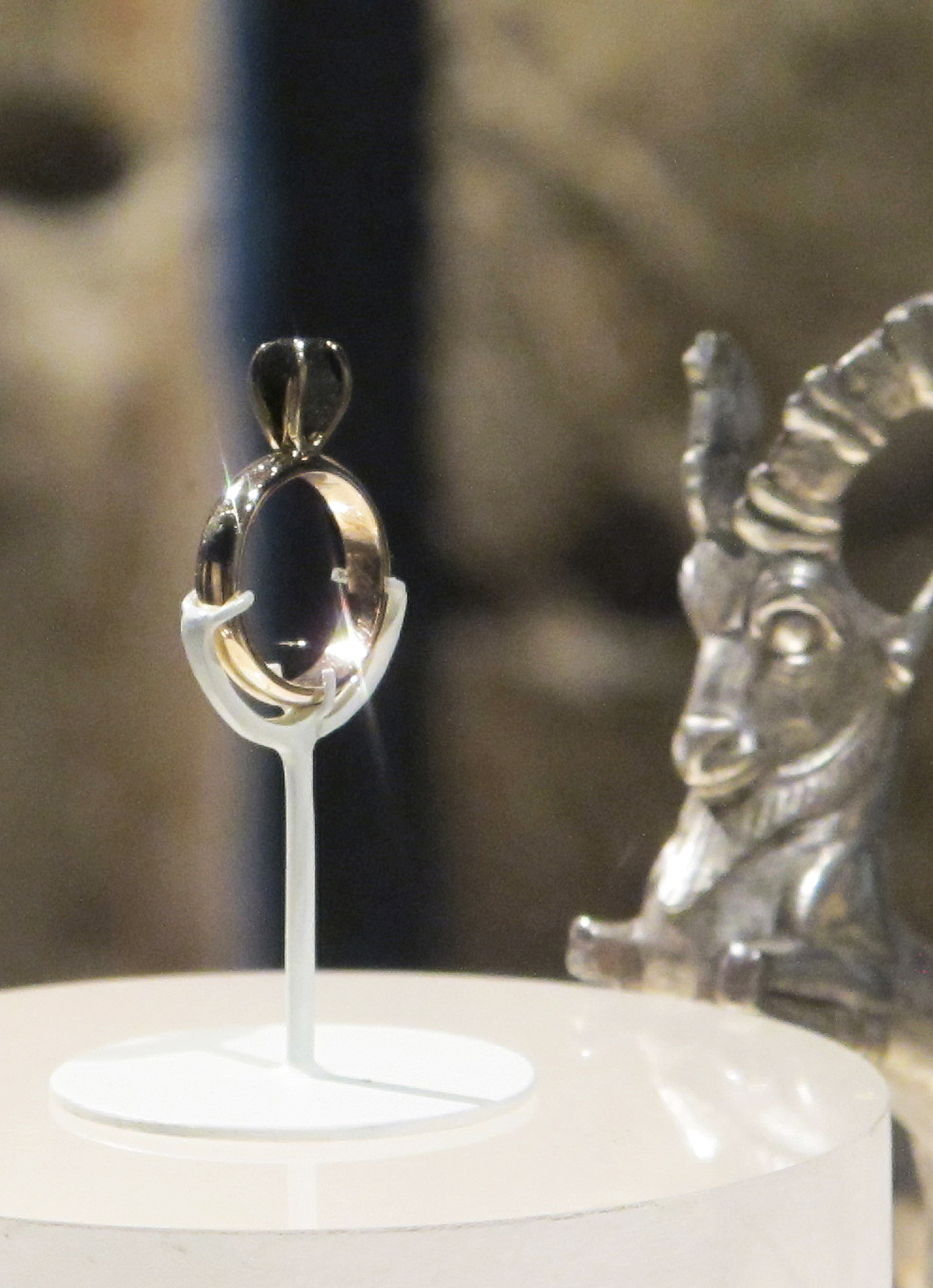 Found pebble mounted on a 14 carat gold ring