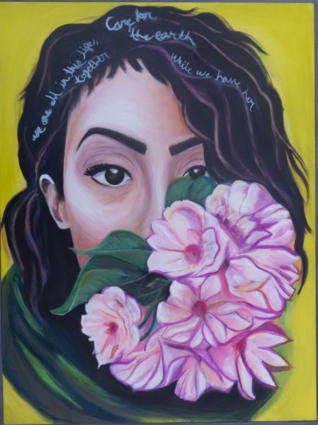  This is a self-portrait I painted. My face is partially hidden behind a bouquet of pink flowers with green leaves. One of my eyes is visible, looking directly out at the viewer, while my dark hair frames my face and carries handwritten words: “We are all 