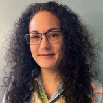 Hawaiian-Chinese woman with brown hair and brown eyes