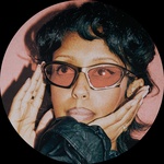 Black woman, Dark brown hair Dark brown eyes.